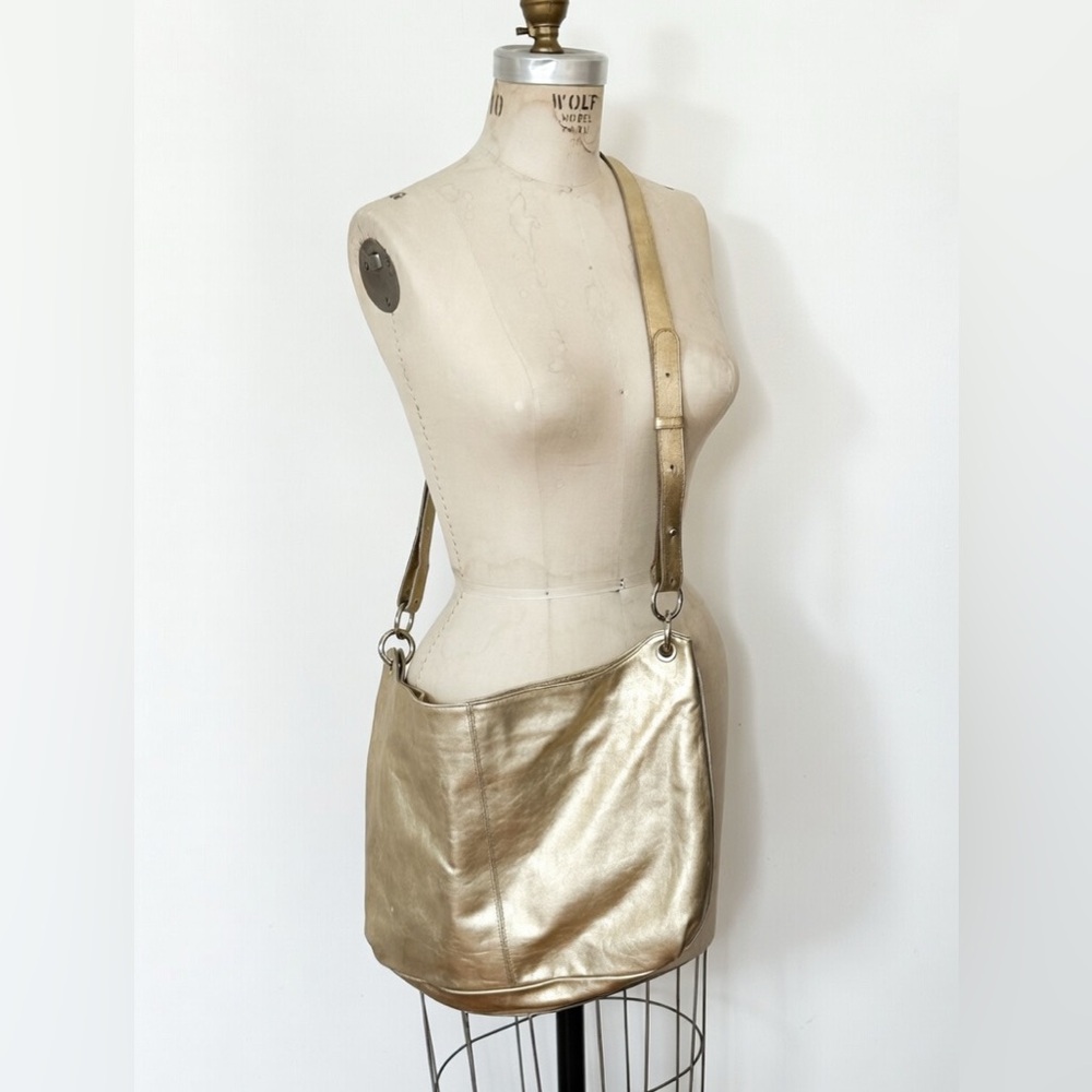 FURLA  Made in Italy. Gold Metalic Leather Handbag with adjustable Straps.